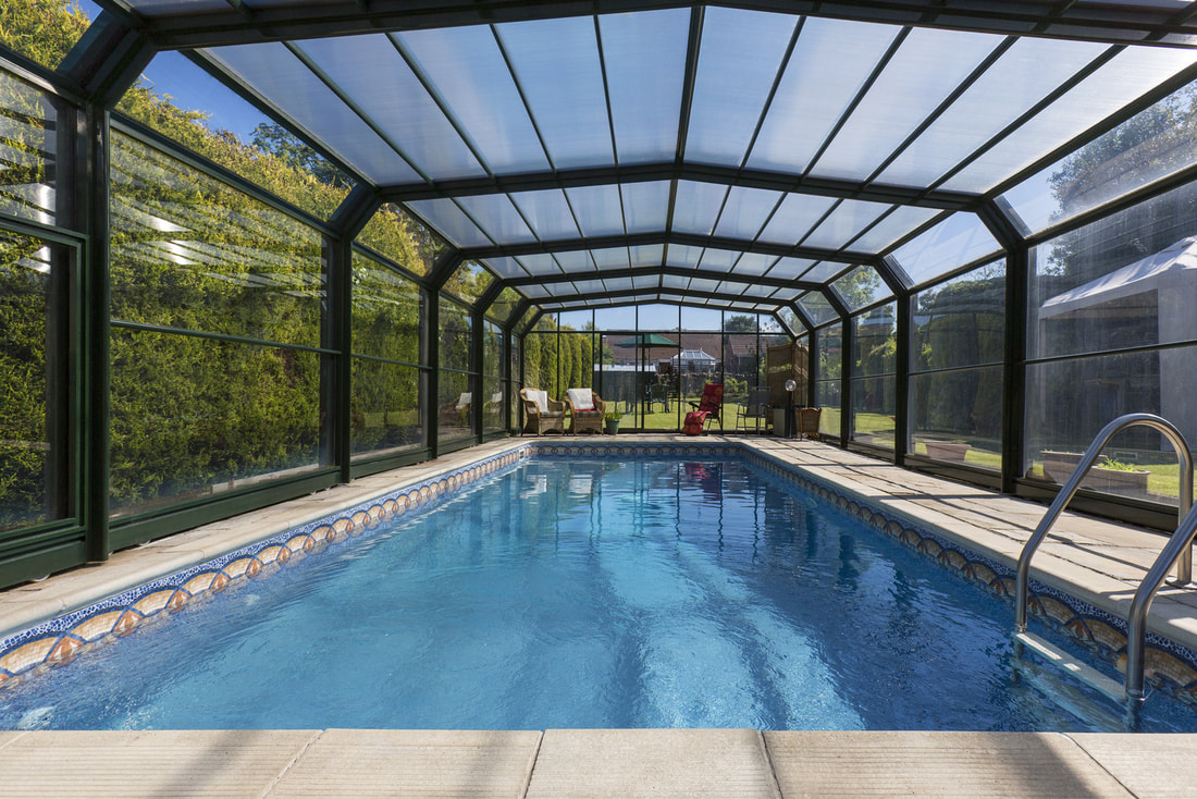 swimming pool inside cage glass
